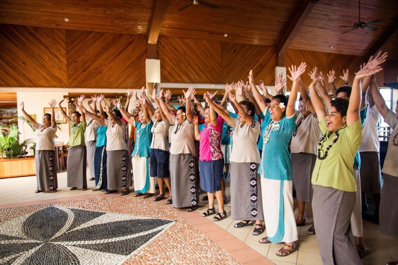 Outrigger Fiji Beach Resort Korotogo Extérieur photo A group of women from the Free Wesleyan Church of Tonga