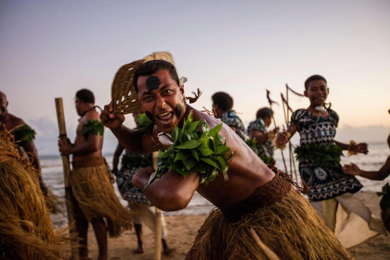 Outrigger Fiji Beach Resort Korotogo Extérieur photo A dancer from the Malaita province