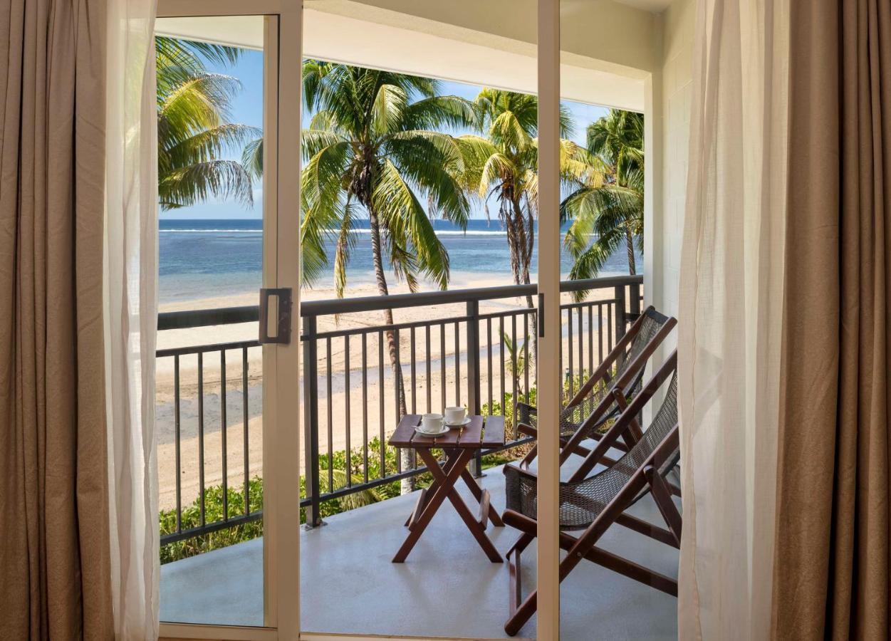 Outrigger Fiji Beach Resort Korotogo Extérieur photo A view of the beach from a room at the resort